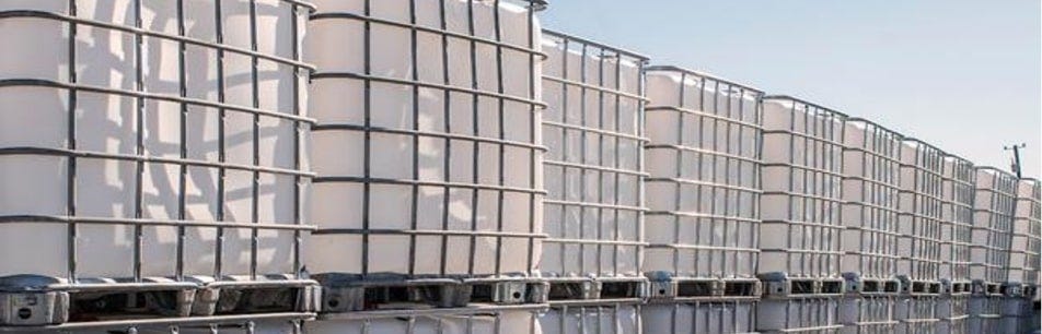 Rows of clean, food-grade IBC totes ready for sale and delivery near you. Rows of clean, food-grade IBC totes ready for sale and delivery near you.