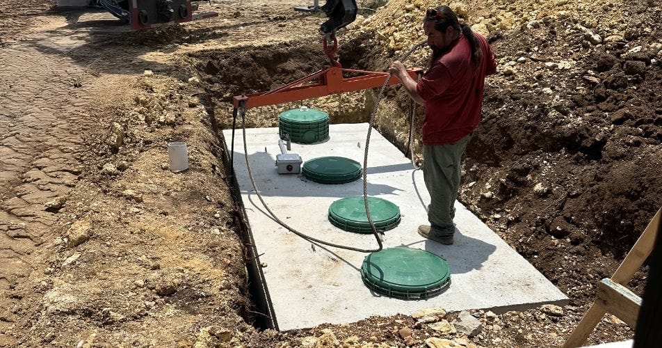Concrete septic tanks are sturdy but require lots of labor to install. Concrete septic tanks are sturdy but require lots of labor to install.