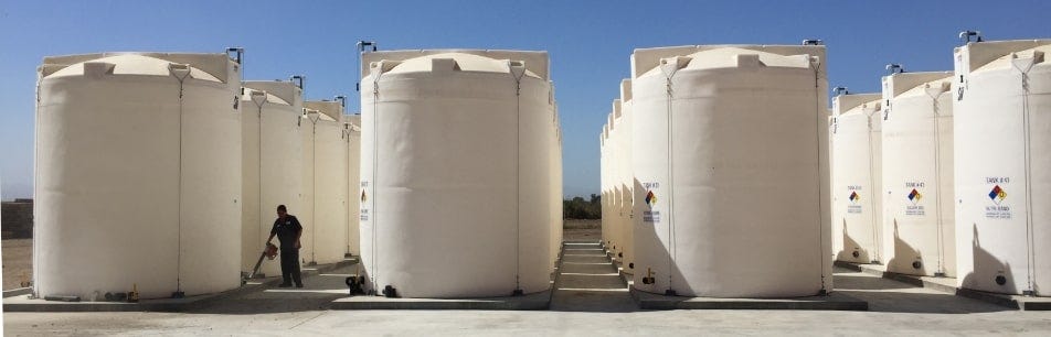 Maintaining industrial chemical dual-containment storage tanks for safe chemical storage. Maintaining industrial chemical dual-containment storage tanks for safe chemical storage.