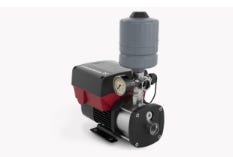 Large bolted steel water storage tank installed at an industrial facility Constant pressure water pump with motor and pressure control unit