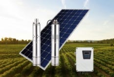 Solar-powered water system with panels, pump, and storage tanks in a field Solar-powered water system with panels, pump, and storage tanks in a field