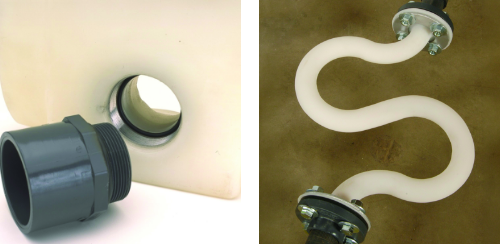 Close-up of tank fittings and flexible connections, including a gray threaded adapter and white expansion loop with bolted flanges. Close-up of tank fittings and flexible connections, including a gray threaded adapter and white expansion loop with bolted flanges.